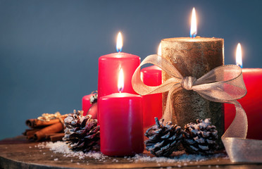 Christmas candles with christmas decorations, christmas or new year atmosphere