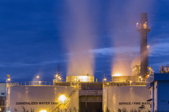 Water Cooling Systems Tower For Gas Turbine Electric Power Plant With Blue Hour.