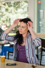 girl drinking cofee in a cafe