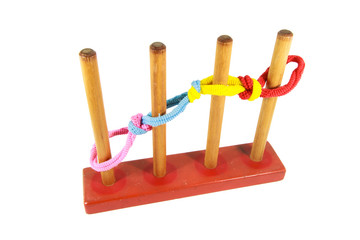 color rubber hair bundle isolated with wooden toy on white background
