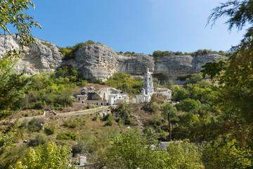 Fototapeta na wymiar The Construction of the Holy Dormition cave monastery