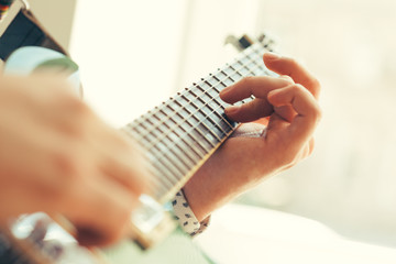 man playing electric guitar © fotofabrika