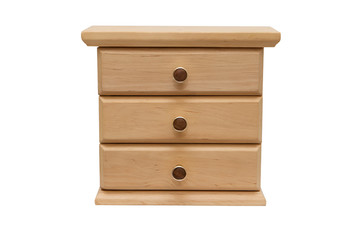 miniature toy chest of drawers made of wood on white isolated background