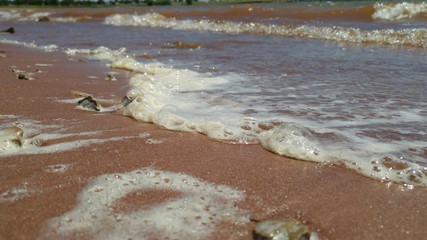 Fototapeta na wymiar Bubbles sand lake beach sunny