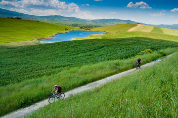 Obraz premium Val d'Orcia, Siena, Tuscany, Italy - Excursion in Mountain Bike