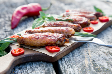 Baked spicy chicken wings in the Asian style