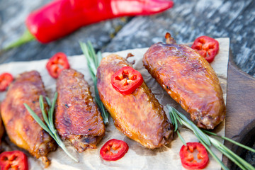 Baked spicy chicken wings in the Asian style