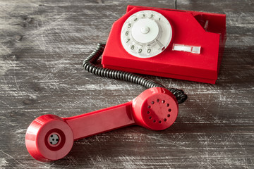 Red phone with rotary dial