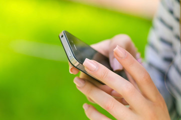 Young woman using her phone