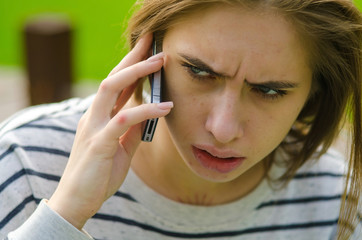 Young woman using her phone