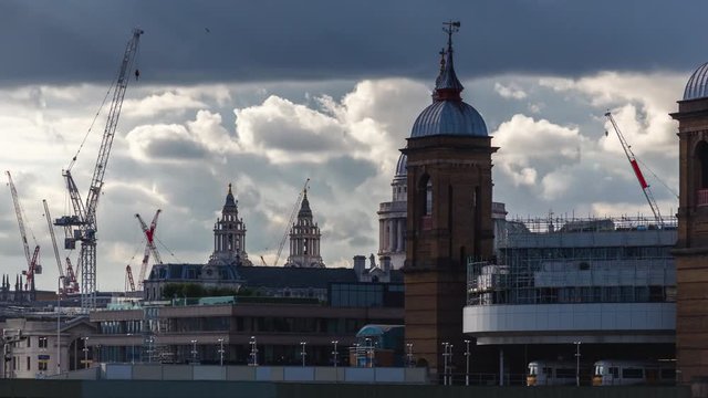 Hyper-Lapse time-lapse at Cannon Street Station with train bridge in London at sunset during the Summer of 2016.
Blue clouds and yellow sun reflects on the River Thames.