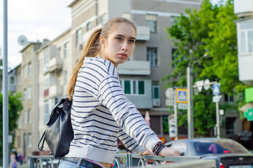 Young woman walking and resting