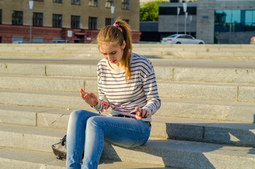 Young woman listening to music