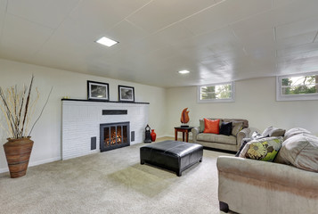 Entertainment Room with fireplace and comfortable sofas