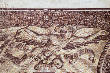 angel with wings image on the old banknote..