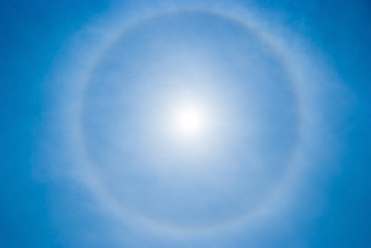 sky background with sun circular rainbow halo