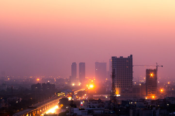 Obraz premium Buildings at dusk in Noida India 
