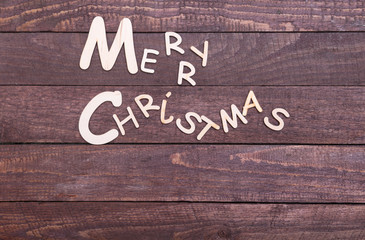 Christmas collection, gifts box, tree and decorative ball, on wood background.