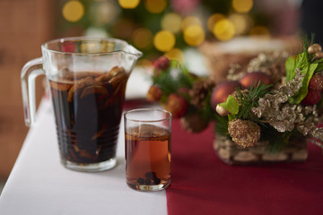 Pot with compote on the table