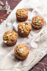 Carrot cupcakes with oat flour and cranberries
