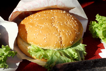Healthy fast food. Vegan burger with fresh vegetables salad