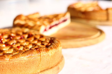Traditional red berry pies tart cake pastry food isolated on white background. Selective focus....