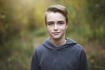 preteen boy in fall time