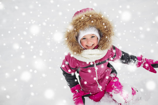 F Happy Little Child Or Girl With Snow In Winter