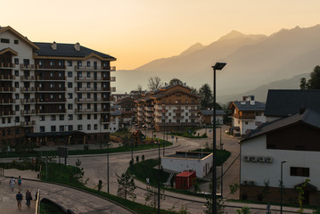 Fototapeta na wymiar Hotels in the mountains at sunset
