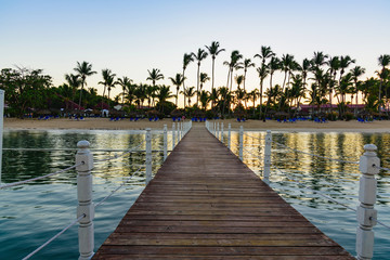 wooden bridge in the sea sunrise