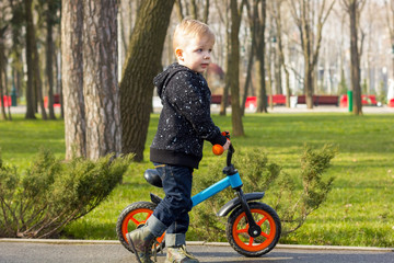 Little boy on the run bike