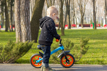 Little boy on the run bike