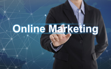 Businessman hand pressing button online marketing. sign on virtual screen.business concept.
