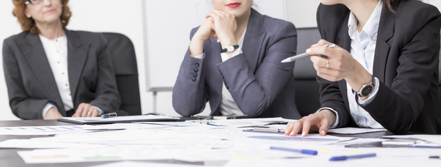 Three businesswomen sitting in their office