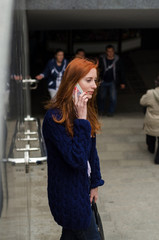 Young woman using her cell phone 