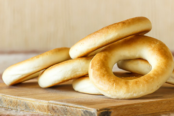 National Russian bagels on a wooden board and  plaid