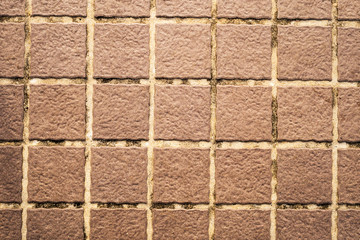 Old brown wall tiles background