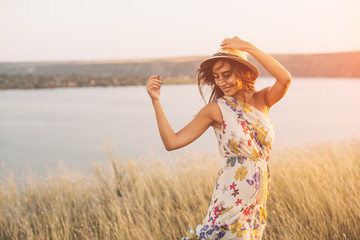 Beauty young girl outdoors enjoying nature