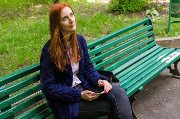 Young woman using her cell phone 