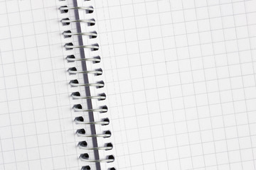 Close up of a notebook with metallic spiral