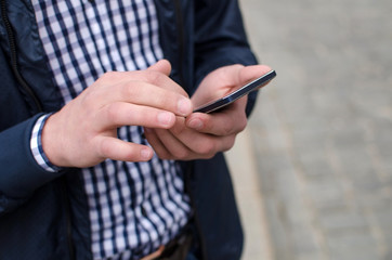 Young man using his phone