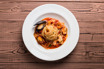 Seafood spaghetti on white plate