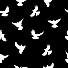 Birds silhouettes - flying seamless pattern. Black and white.