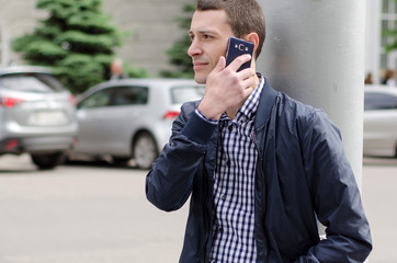 Young man using his phone