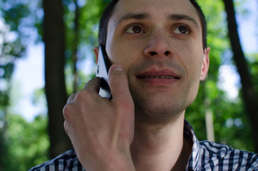 Young man using his phone