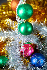Fototapeta na wymiar Gold Christmas background of de-focused lights with decorated tree