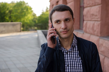 Young man using his phone