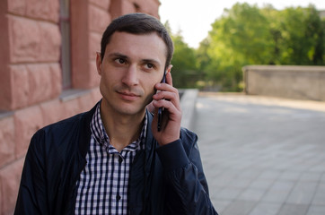 Young man using his phone