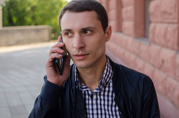 Young man using his phone