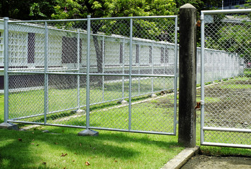 Wire mesh with white field in a public park